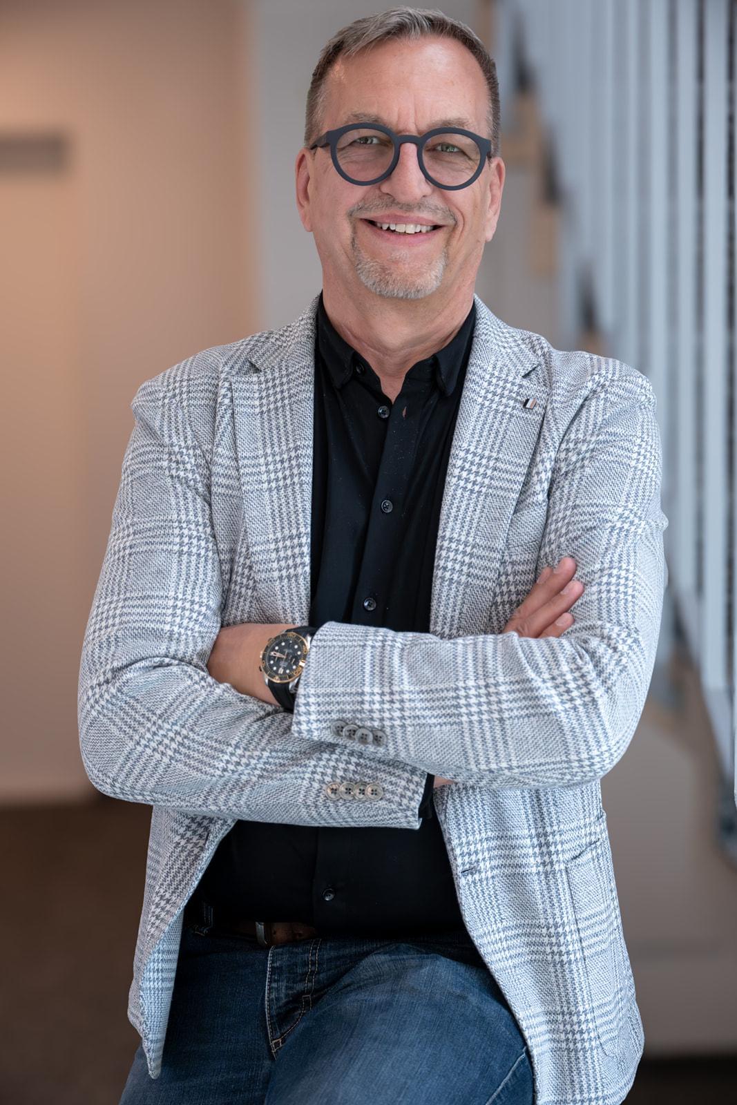 Porträt von Mark Bracher, Mark Bracher AG